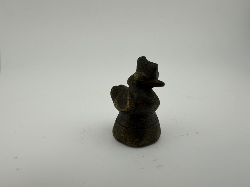 A set of six dark bronze zoomorphic trade weights depicting various animals mounted on octagonal and circular pedestals. View IX