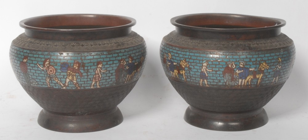 A pair of round dark bronze cachepots featuring a wide band of turquoise champleve enamel decorated with Greco-Roman figures.
