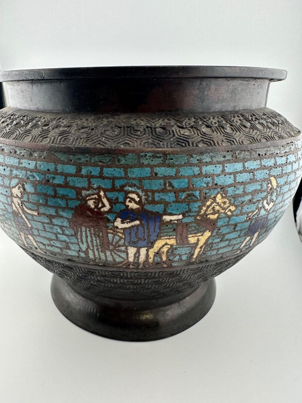 A pair of round dark bronze cachepots featuring a wide band of turquoise champleve enamel decorated with Greco-Roman figures. View III