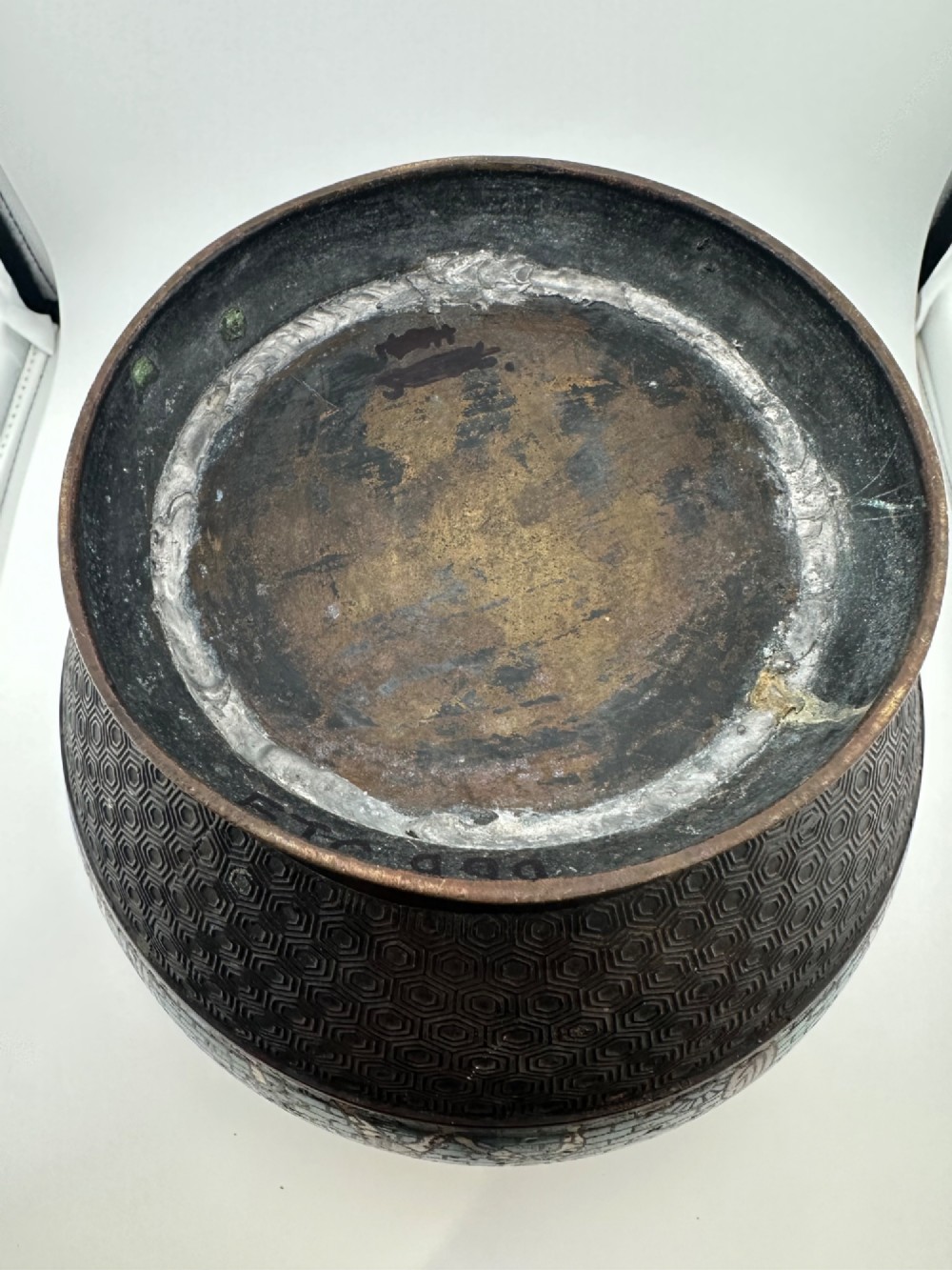 A pair of round dark bronze cachepots featuring a wide band of turquoise champleve enamel decorated with Greco-Roman figures. View V