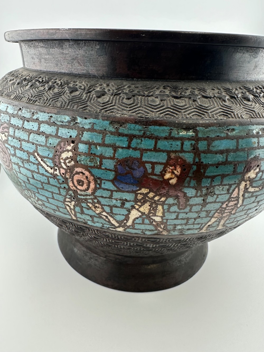 A pair of round dark bronze cachepots featuring a wide band of turquoise champleve enamel decorated with Greco-Roman figures. View VI