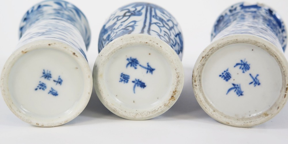 A set of three 19th-century Chinese blue and white porcelain vases featuring hand-painted floral motifs and figurative scenes. View II