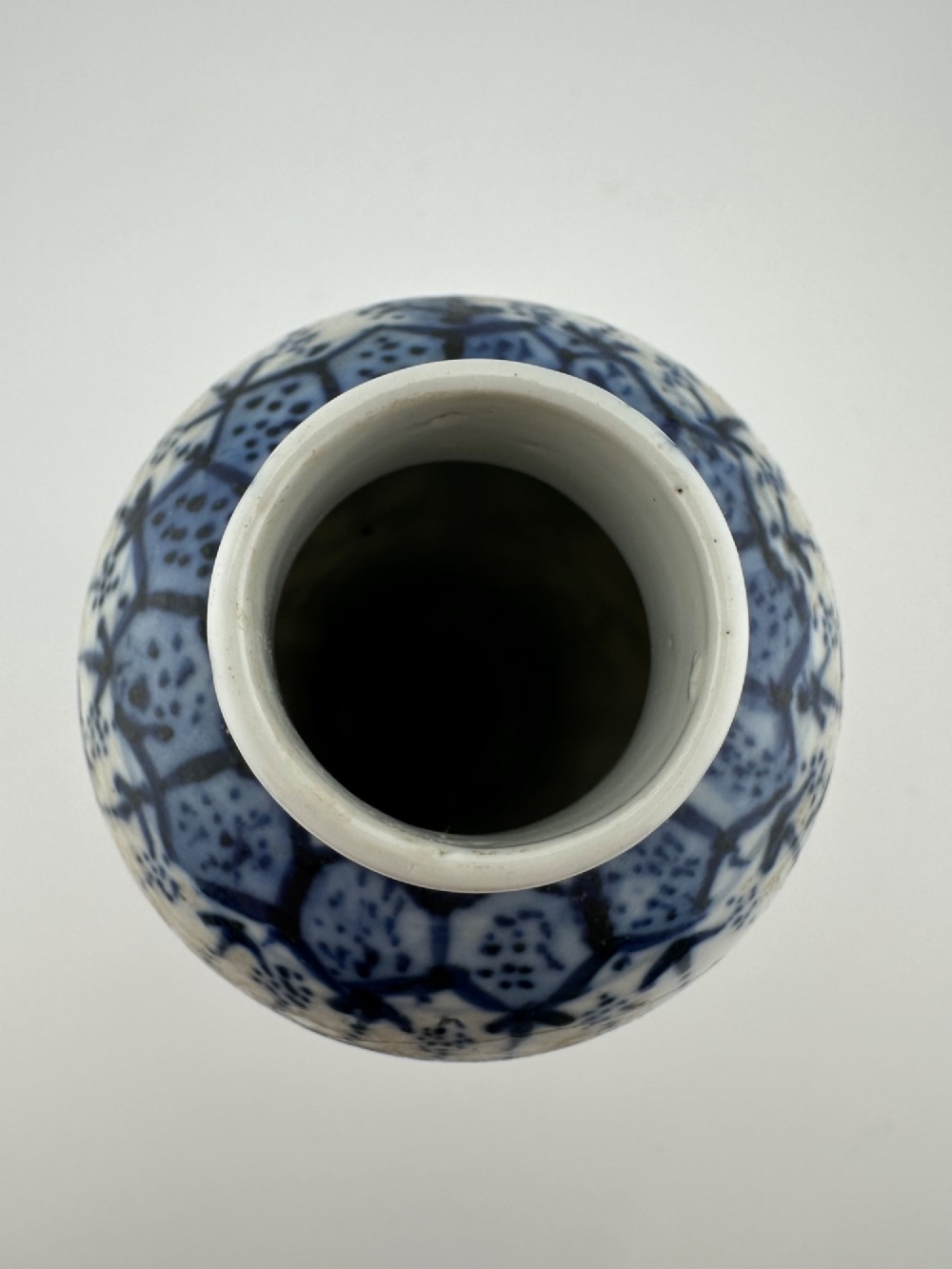 A set of three 19th-century Chinese blue and white porcelain vases featuring hand-painted floral motifs and figurative scenes. View IX