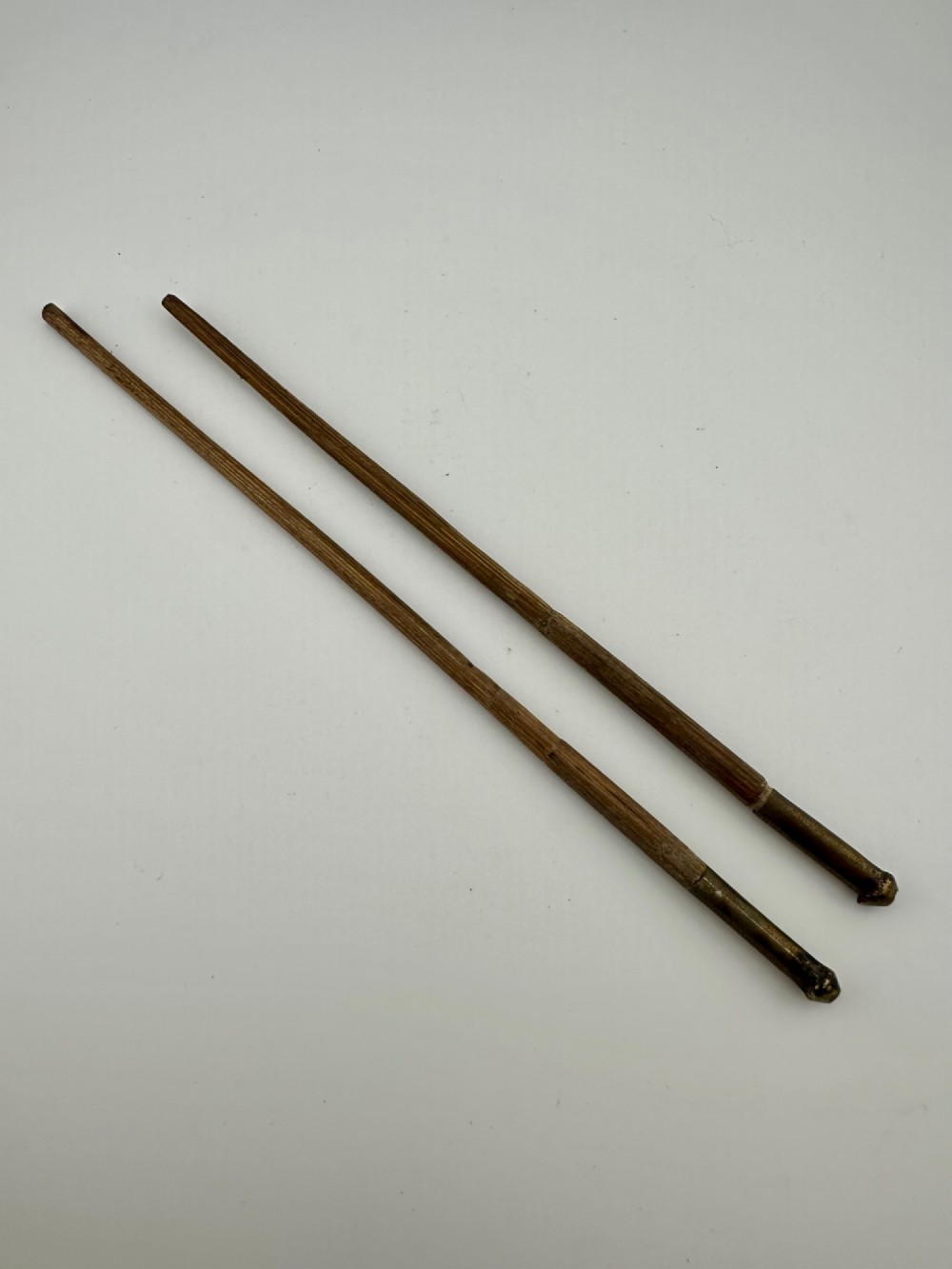 A 19th-century Chinese Qing Dynasty travelling eating set with chopsticks and knife stored inside an embossed brass-mounted sheath. View III