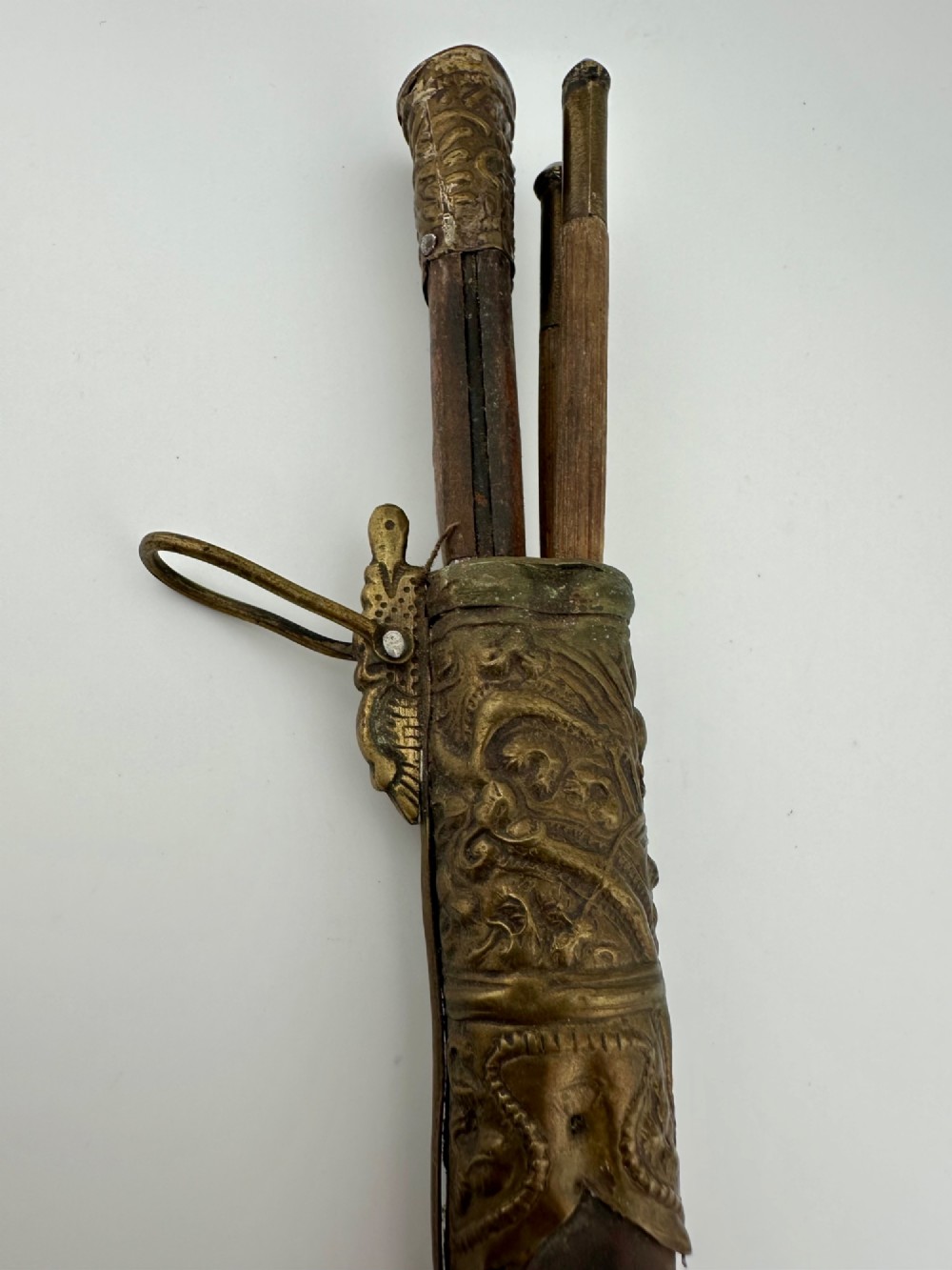 A 19th-century Chinese Qing Dynasty travelling eating set with chopsticks and knife stored inside an embossed brass-mounted sheath. View V