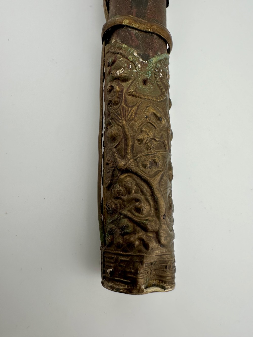 A 19th-century Chinese Qing Dynasty travelling eating set with chopsticks and knife stored inside an embossed brass-mounted sheath. View VI