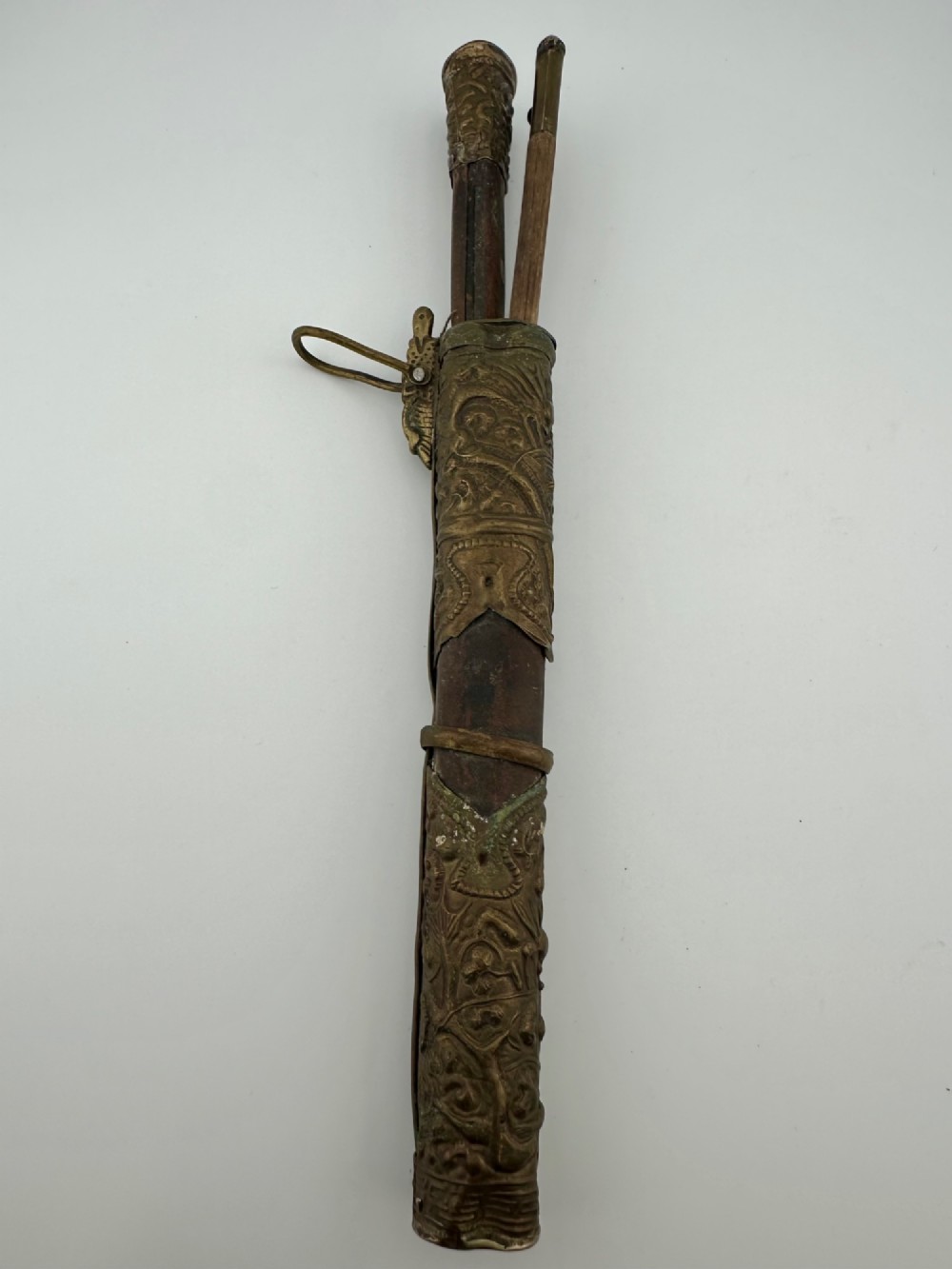 A 19th-century Chinese Qing Dynasty travelling eating set with chopsticks and knife stored inside an embossed brass-mounted sheath. View VIII