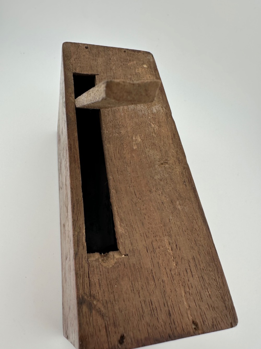 A rectangular dark wooden church collection box featuring a coin slot on top and a printed yellow and red Society for the Propagation of the Gospel label on the front. View XI