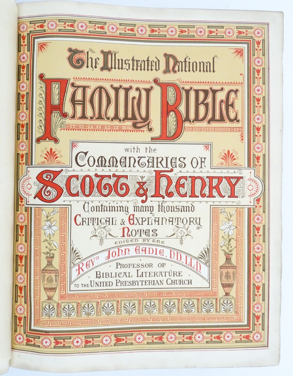 A dark leather-bound Victorian Holy Bible featuring gilt lettering inside a star-shaped frame and decorative brass corner mounts. View II