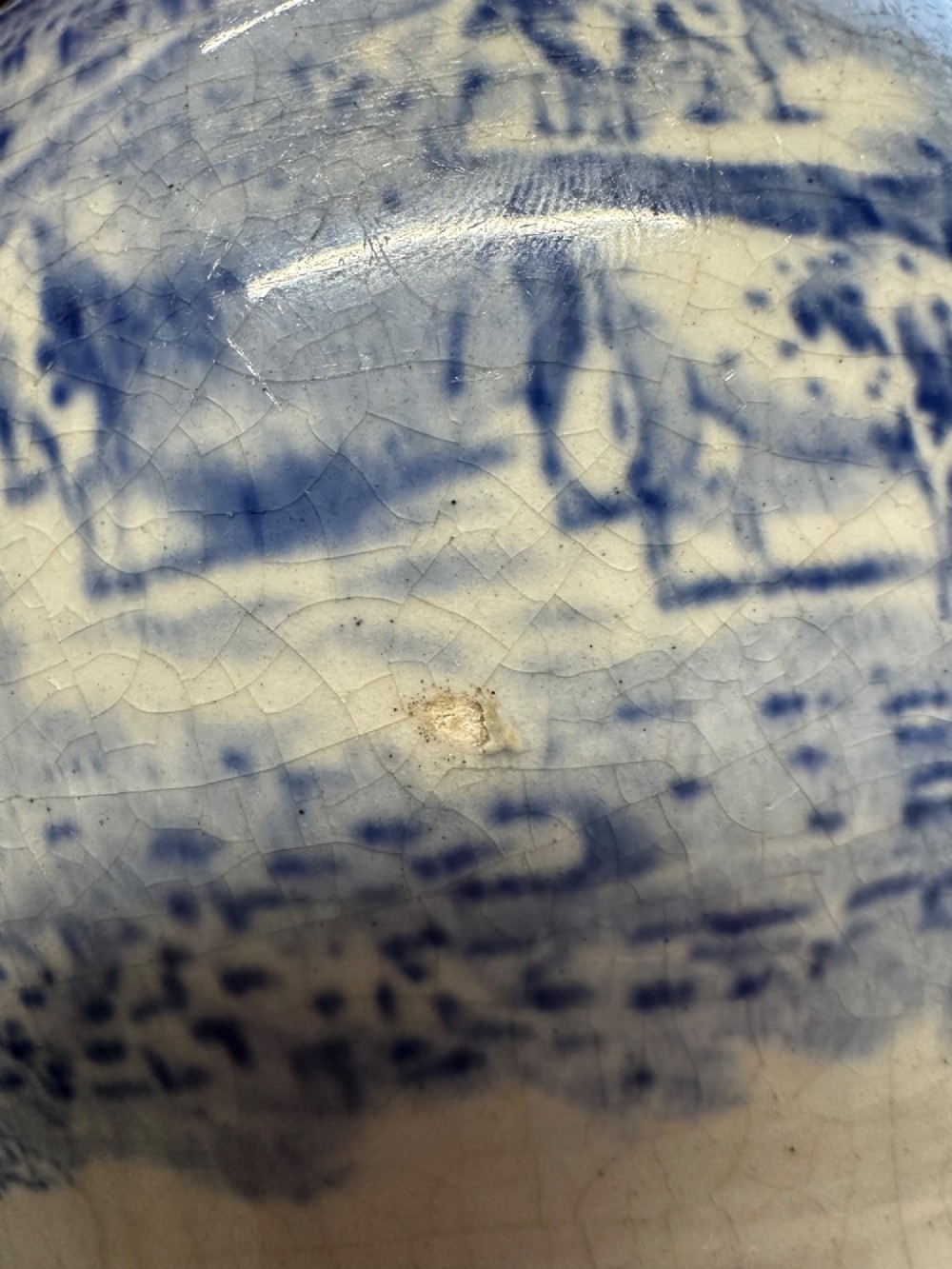 An early Victorian blue and white transferware ceramic jug featuring a pastoral cattle scene with fine glaze crazing throughout. View XV