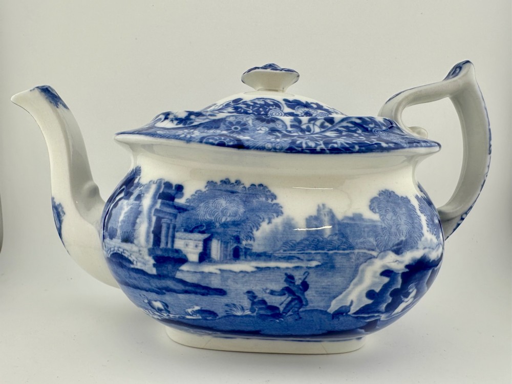 An antique blue and white transferware ceramic teapot in the Copeland Spode Blue Italian pattern featuring an Egyptian shape profile. View III