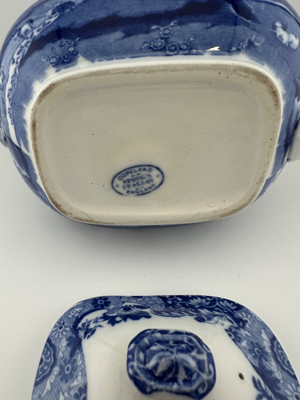 An antique blue and white transferware ceramic teapot in the Copeland Spode Blue Italian pattern featuring an Egyptian shape profile. View VIII