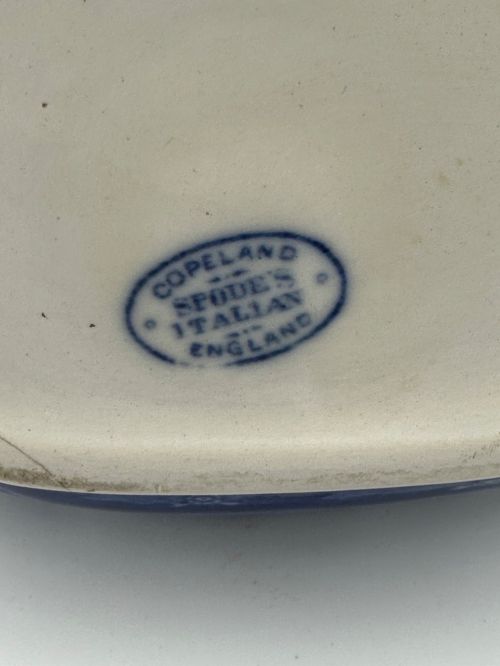 An antique blue and white transferware ceramic teapot in the Copeland Spode Blue Italian pattern featuring an Egyptian shape profile. View XI