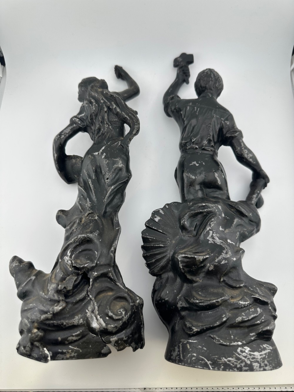 A pair of dark bronze-finished French spelter allegorical figures raised on moulded circular bases representing Mutualite and Paix. View XI