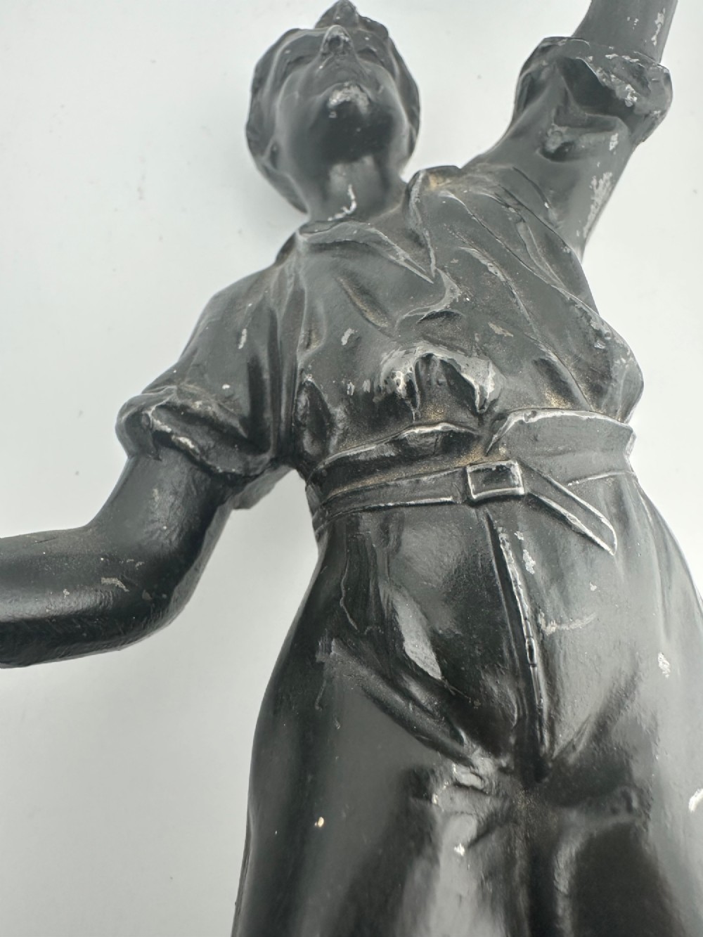 A pair of dark bronze-finished French spelter allegorical figures raised on moulded circular bases representing Mutualite and Paix. View XIV