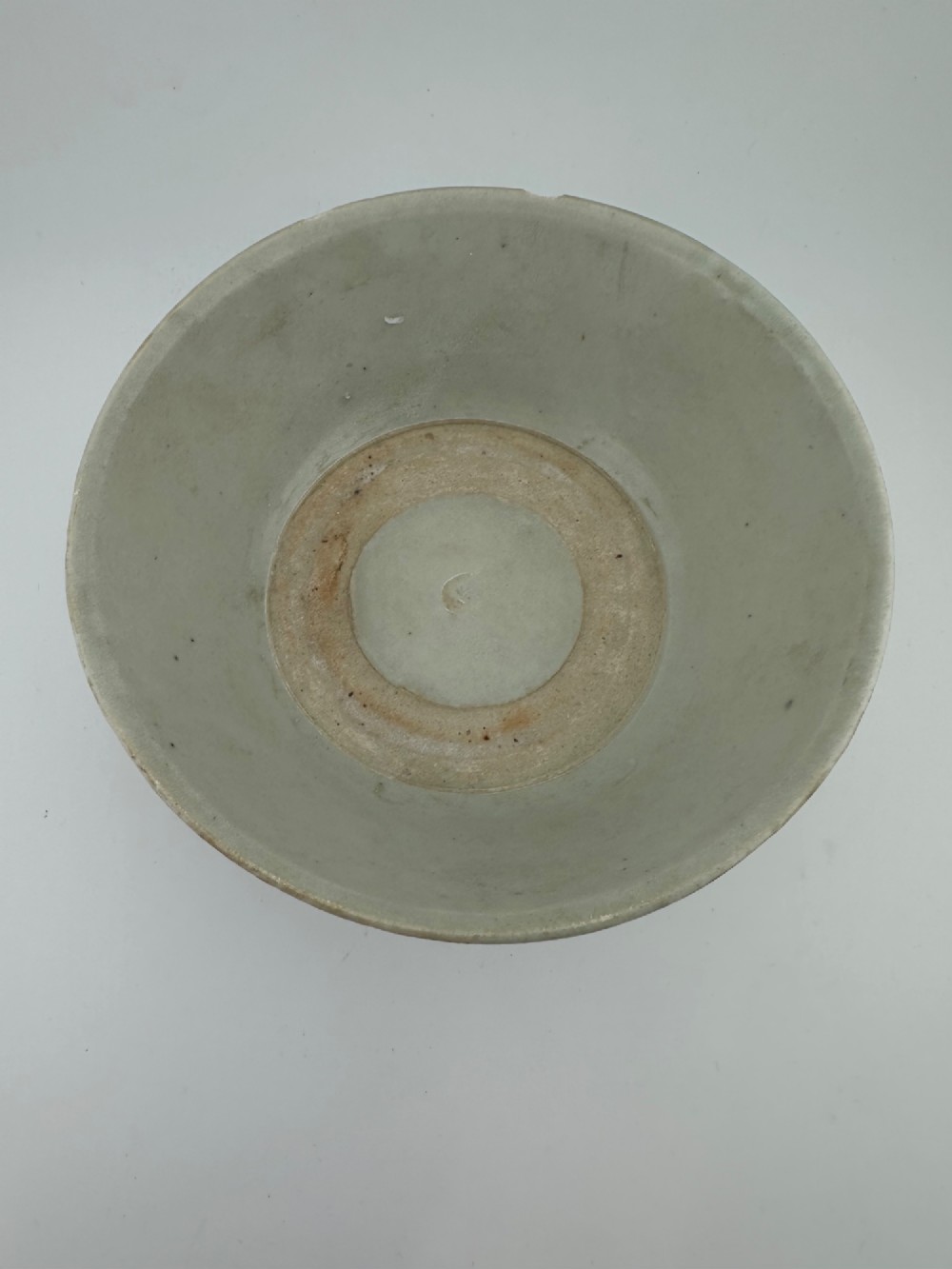 A nineteenth century Chinese Qing Dynasty shipwreck porcelain bowl decorated with cobalt blue underglaze landscape imagery. View VI