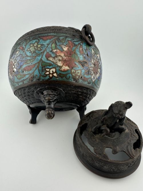 A dark bronze globular tripod incense burner featuring colourful enamel lotus motifs, side ring handles, and a pierced lid with a seated Qilin finial. View VIII