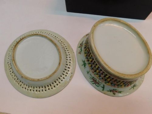 A 19th-century Chinese Famille Rose reticulated porcelain chestnut basket with pierced lattice sides resting near a matching circular undertray. View VII