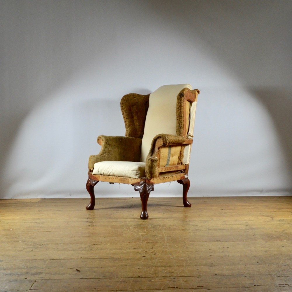 19TH CENTURY ENGLISH WING CHAIR     Upholstery included