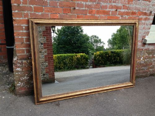 A Stunning Original Large Early 19th Century French Antique Gilt and Red Mirror.