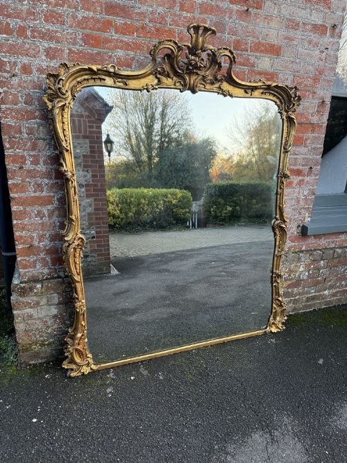 A Spectacular Large Antique English 19th Century Carved Wood  & Gesso Gilt Overmantle Mirror.