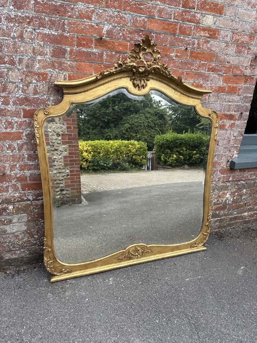 A Spectacular Large Antique English 19th Century Ornate Carved Wood Shaped Top Gilt Overmantle Mirror.