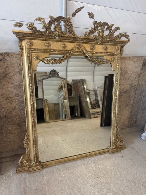 An Exceptional Large Antique English 19th Century Gilt Overmantle Mirror.
