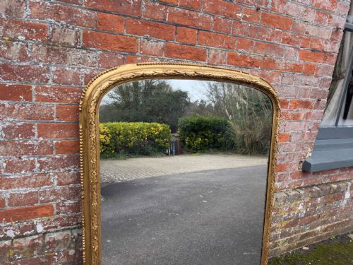 A FABULOUS LARGE ANTIQUE ENGLISH 19TH CENTURY CARVED WOOD AND GESSO ARCHED TOP GILT LAUREL LEAF FRAMED OVERMANTLE - ADDITIONAL PHOTO 1