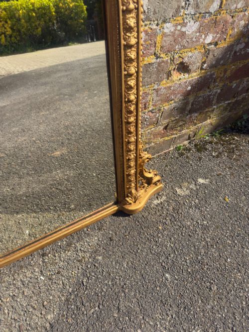 A DELIGHTFUL SMALL ANTIQUE ENGLISHN19TH CENTURY CARVED WOOD AND GESSO ARCHED TOP GILTOVERMANTEL MIRROR - ADDITIONAL PHOTO 2