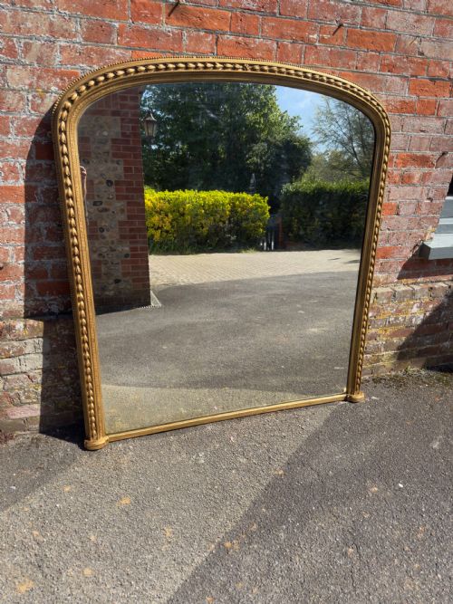 A SPECTUALAR LARGE ANTIQUE ENGLISH 19TH CENTURY CARVED WOOD GESSO ARCHED TOP GILT TULIP FRAMED OVERMANTEL MIRROR - ADDITIONAL PHOTO 5