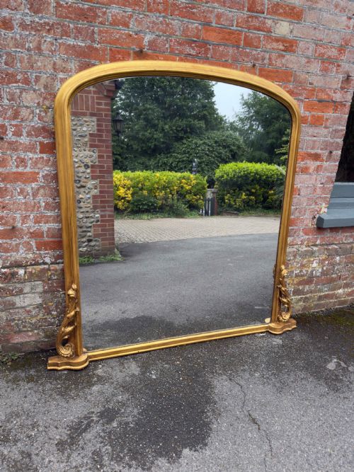 A LARGE ANTIQUE ENGLISH 19TH CENTURY CARVED WOOD WOOD GESSO ARCHED TOP GILT OVERMANTLE MIRROR