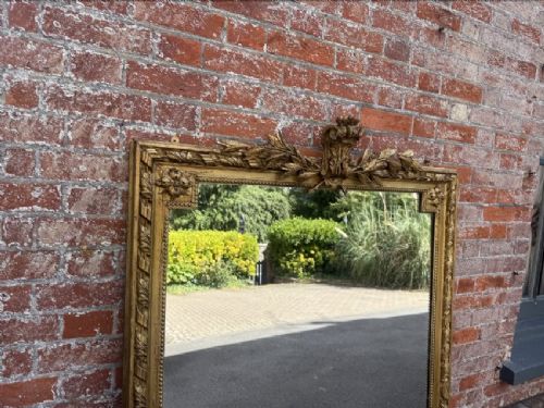A large 19th-century French rectangular mirror featuring a carved gold leaf frame adorned with a rope twist border and a decorative foliage crest. View III