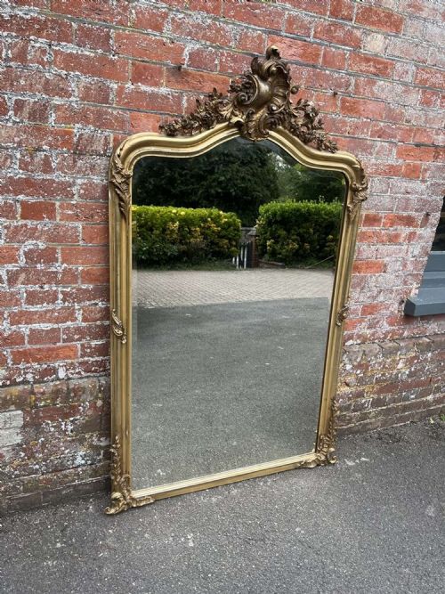 A Spectacular Large Antique French 19th Century French Carved Wood & Gesso Shaped Top Gilt Mirror