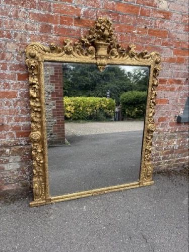 An Exceptional Large Antique English 19th Century Carved Wood Gilt overmantle Mirror.