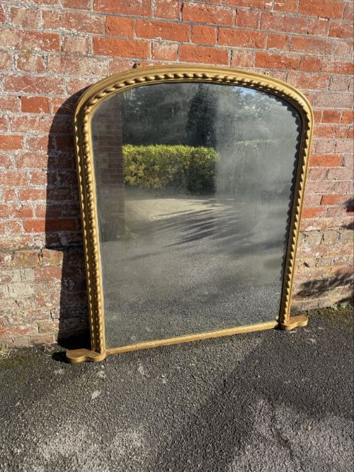 A Fabulous large Antique English 19th Century  arched top carved wood & gesso gilt ribbed Overmantle Mirror.