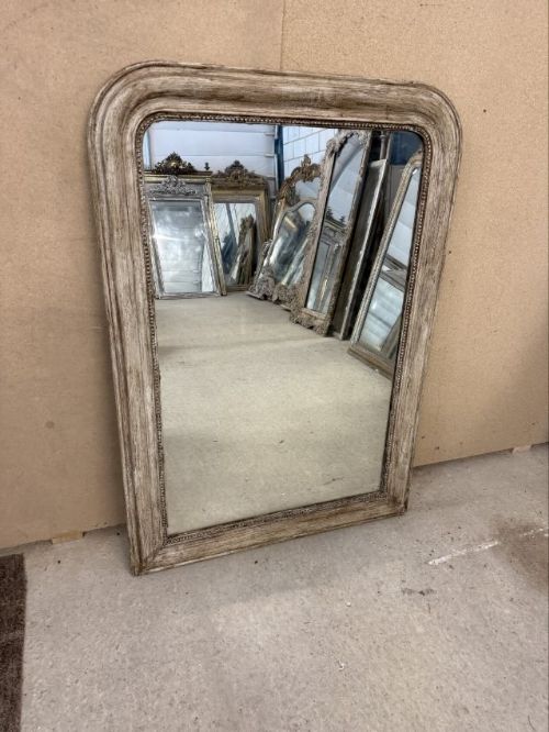 A Highly useful Antique French 19th Century carved wood Louis Philippe arched top Mirror.