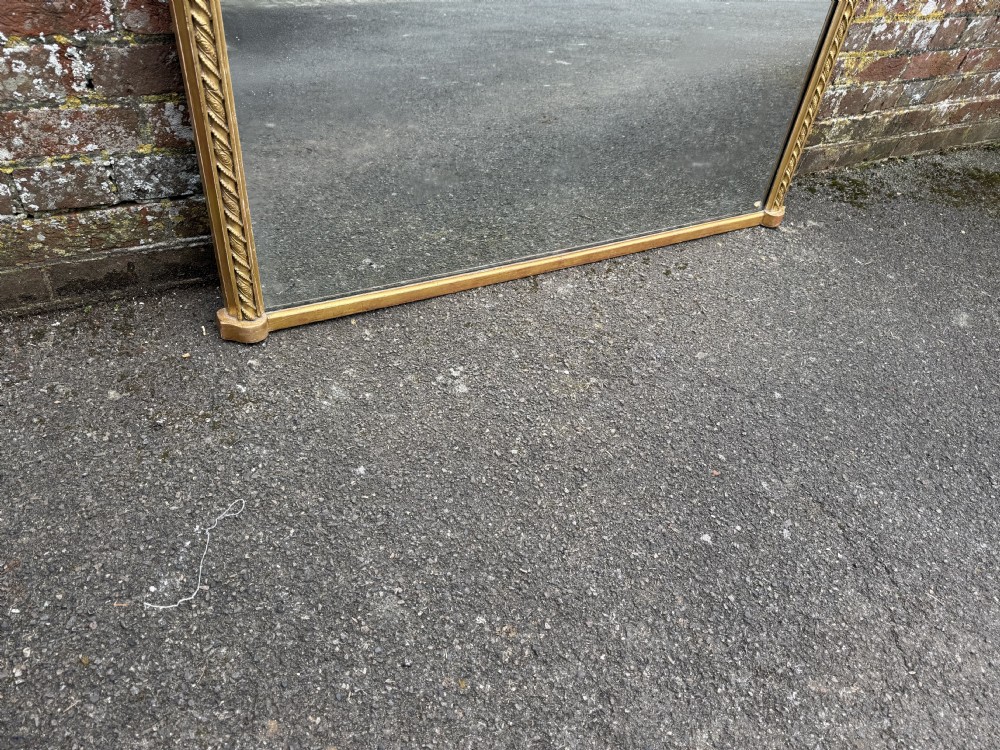 A Fabulous large Antique English 19th Century carved wood & gesso shaped top gilt Overmantle Mirror. View II