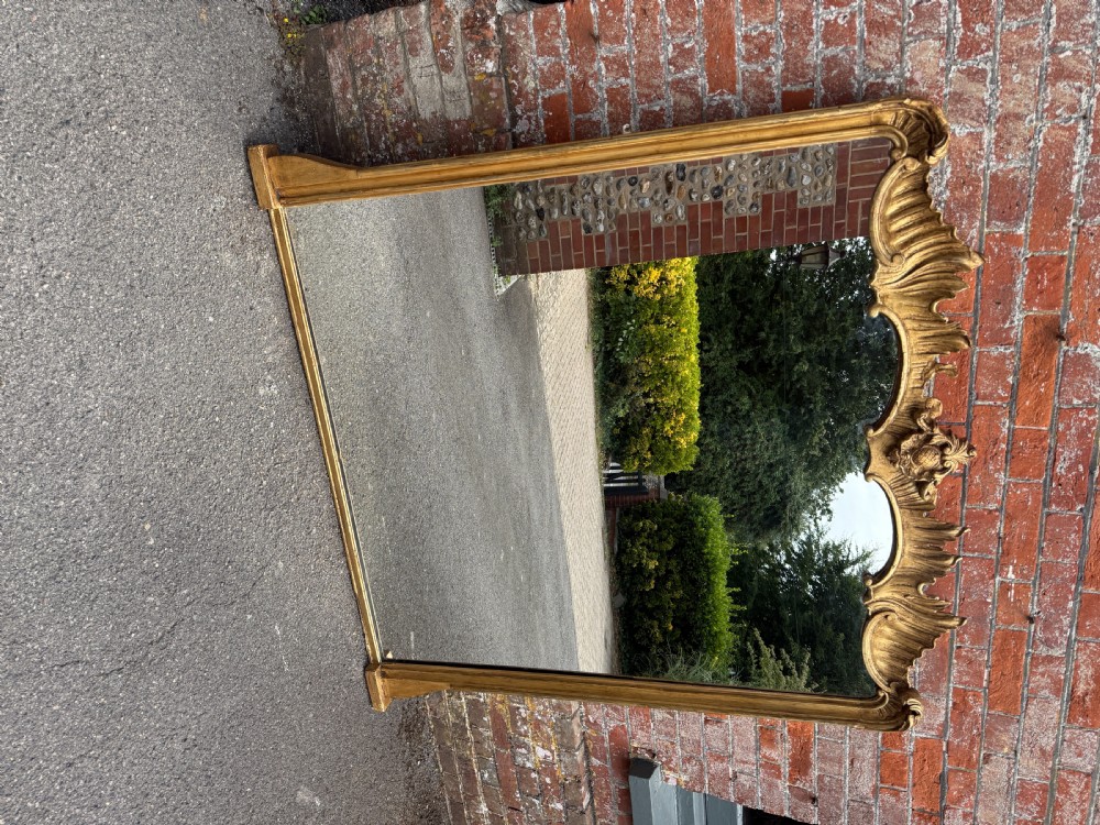 An Exceptional large Antique English 19th C carved wood & gesso gilt shaped top Overmantle Mirror. View VII