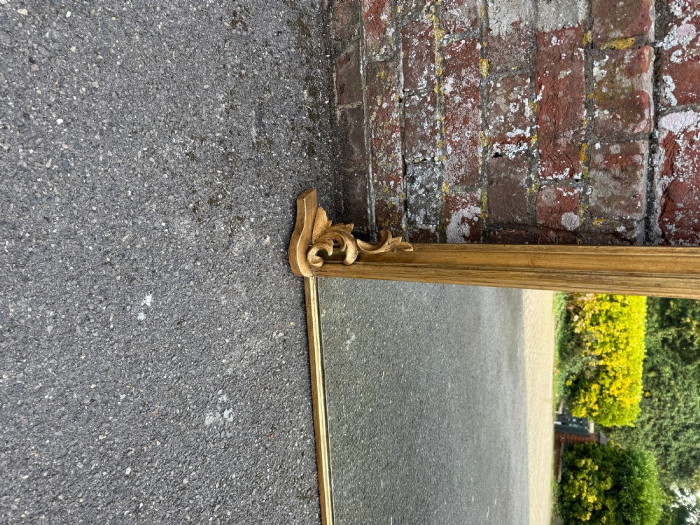 A Fabulous large Antique 19th Century English carved wood & gesso gilt Ovemantle Mirror. View II