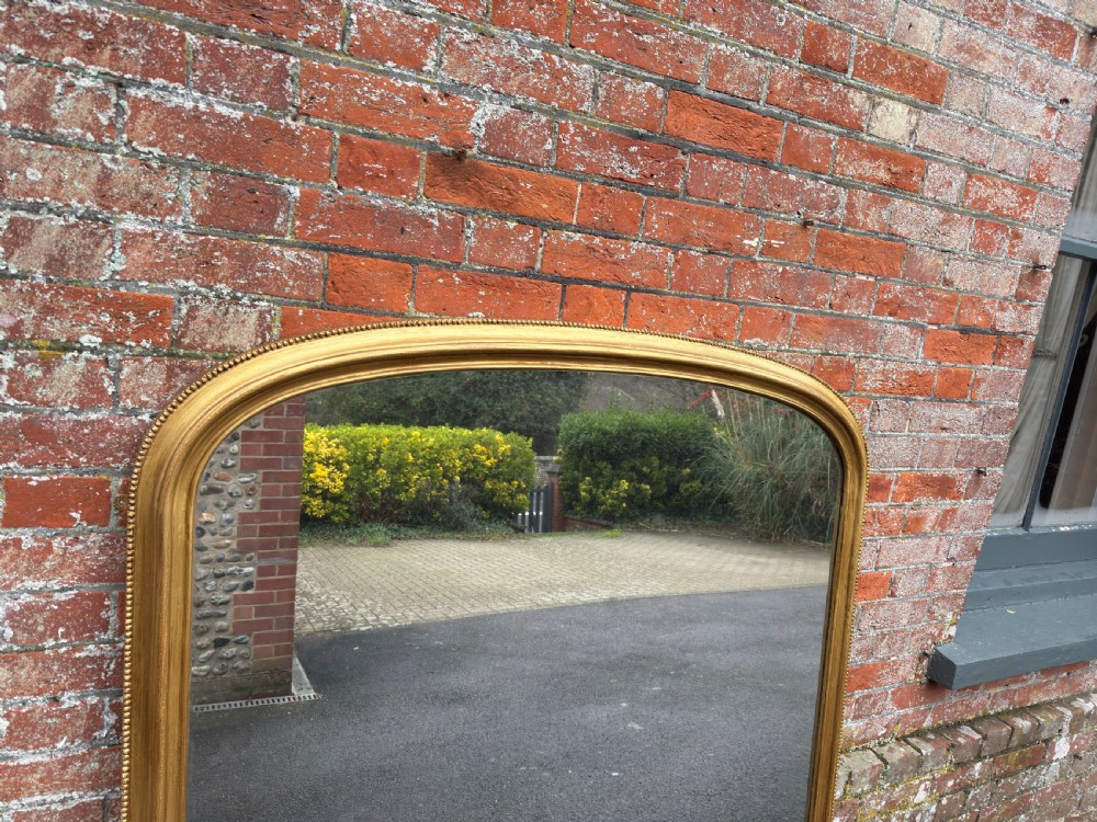 An Exceptional large Antique English 19th Century Carved wood & gesso arched top gilt Overmantle Mirror. View II