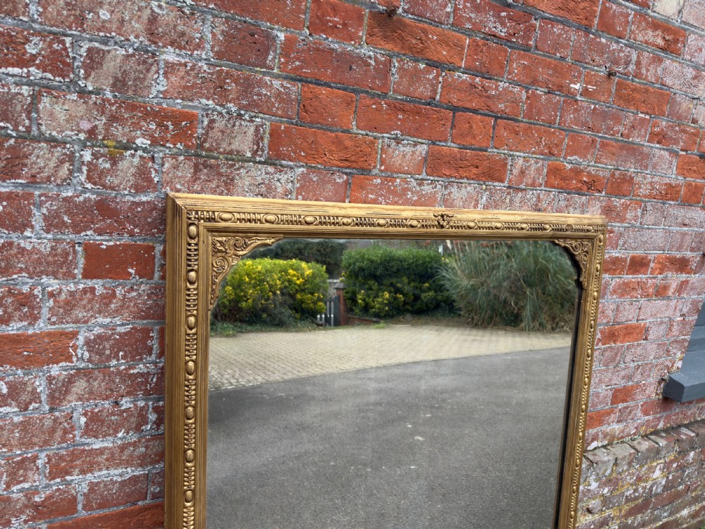 A Wonderful large Antique English 19th Century carved wood and gesso gilt Overmantle Mirror. View II