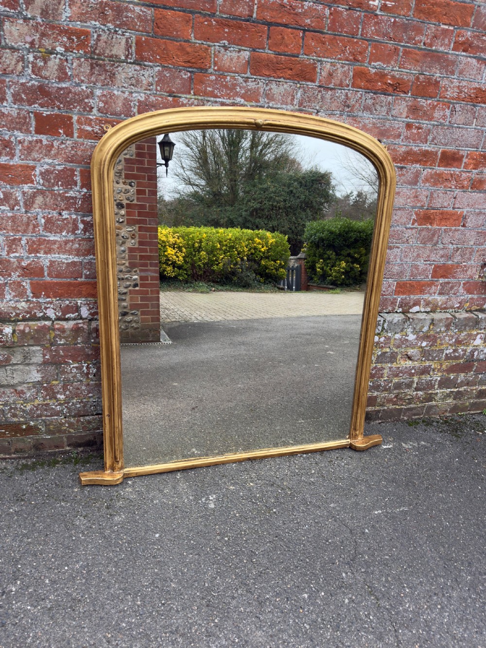 A Delightful large Antique English 19th Century carved wood & gesso arched top gilt Overmantle Mirror.