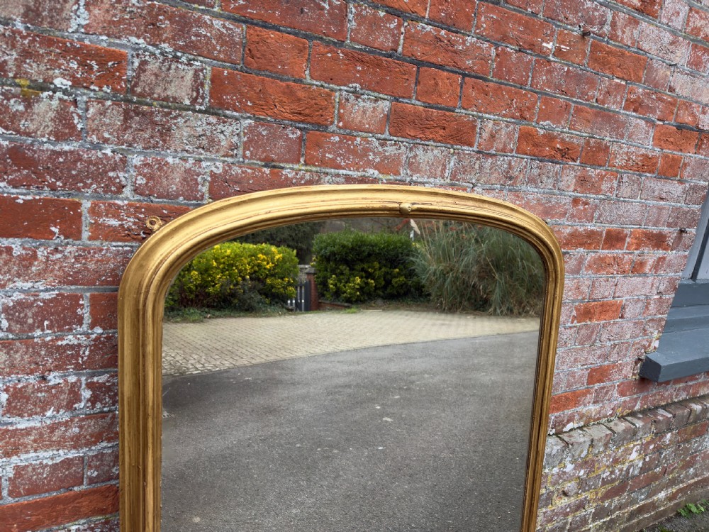 A Delightful large Antique English 19th Century carved wood & gesso arched top gilt Overmantle Mirror. View II