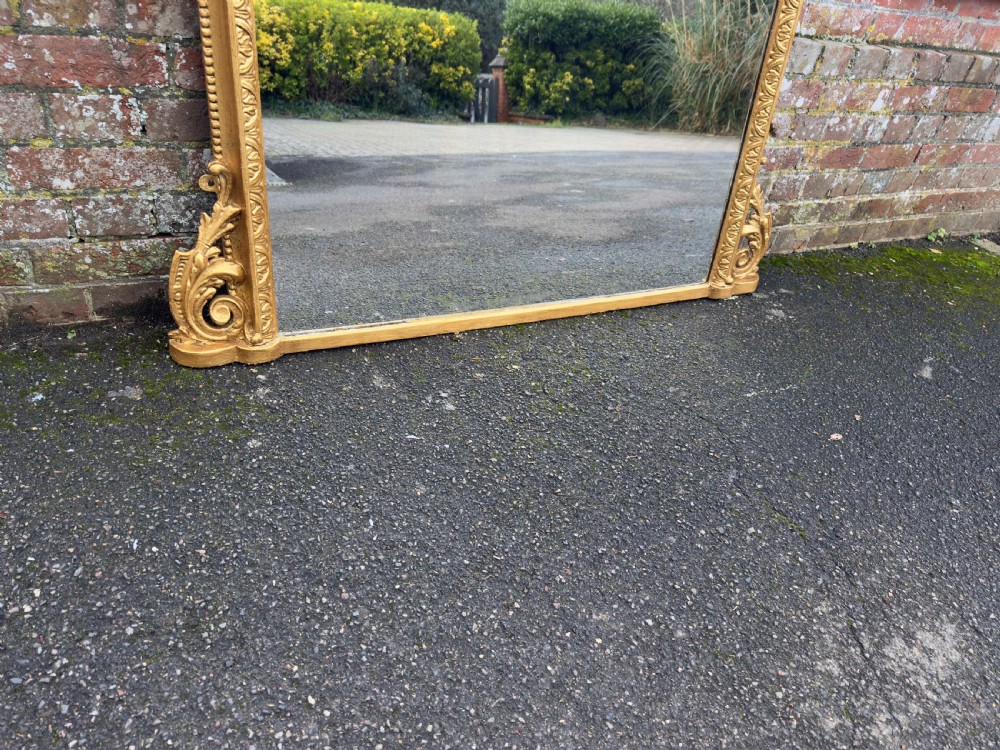A Stunning large Antique English 19th Century carved wood & gesso arched top gilt Overmantle Mirror. View VI