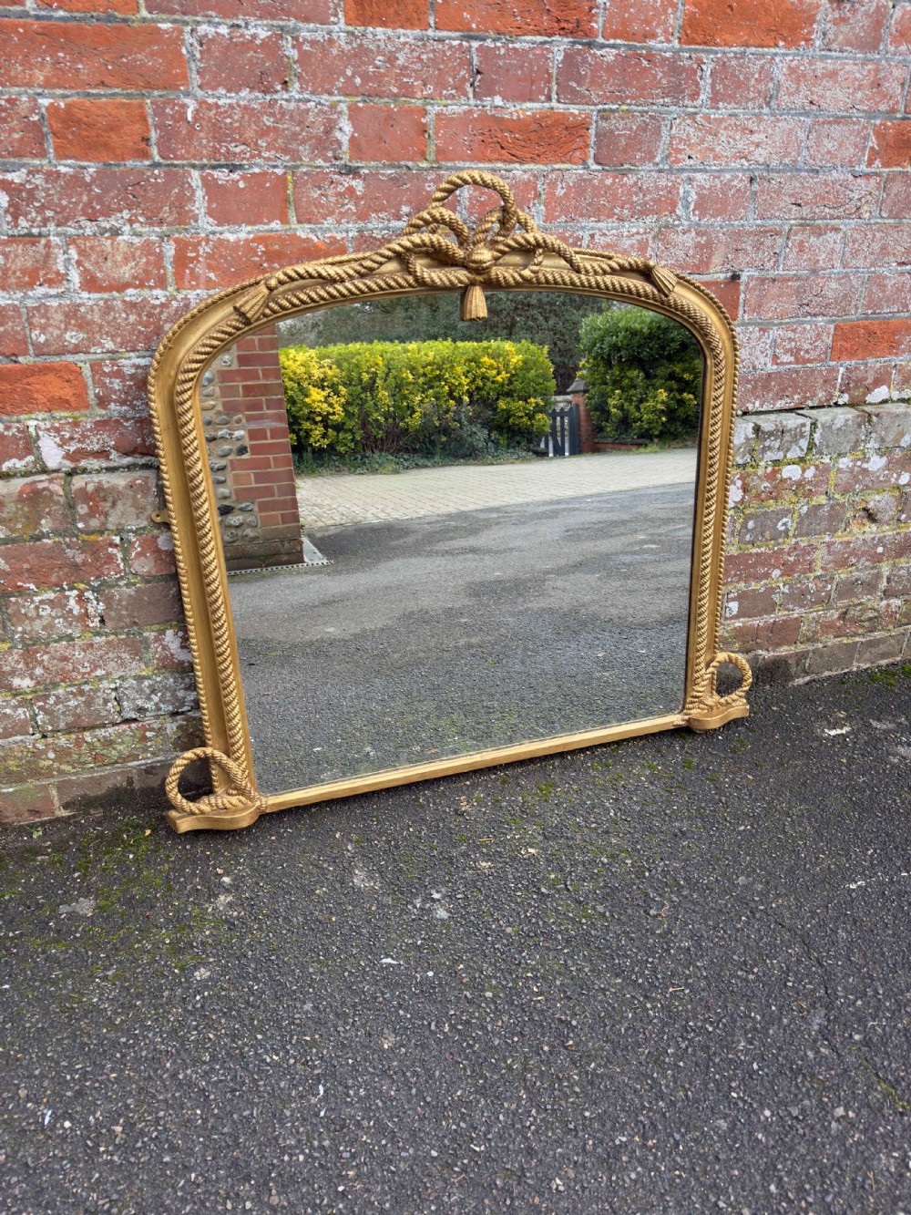 An Exceptional good size Antique English 19th Century carved wood & gesso arched top gilt Overmantle Mirror.