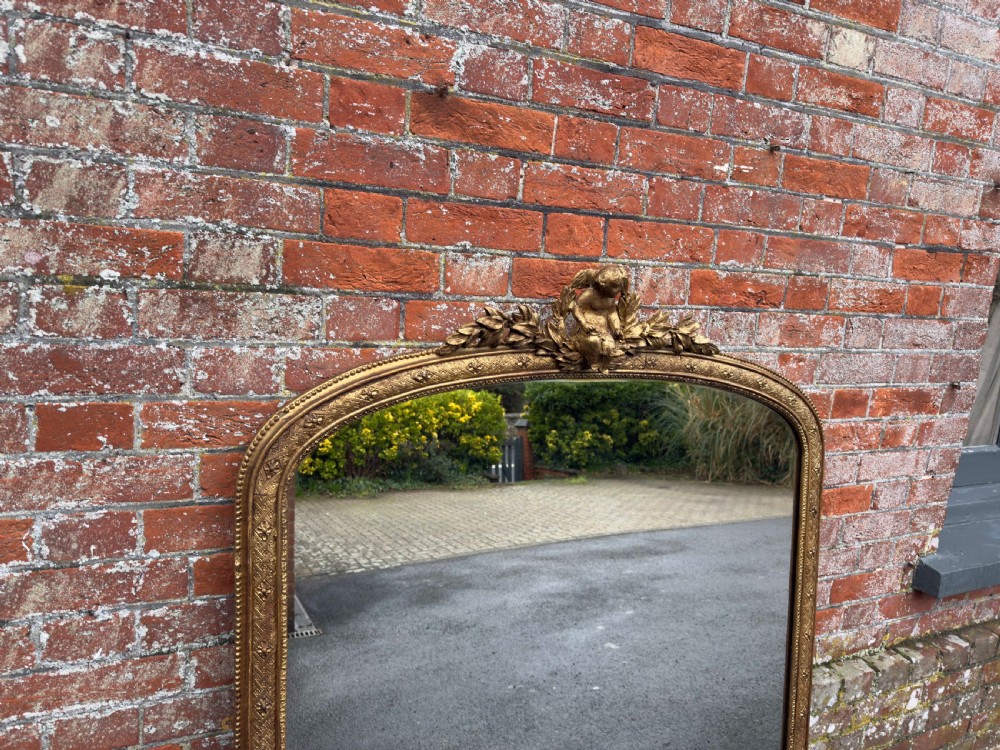 A Specatular large Antique English 19th Century carved wood & gesso arched top gilt Overmantle Mirror. View III