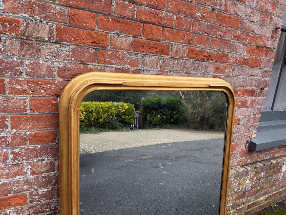 A Delightful large Antique English 19th Century carved wood & gesso arched top gilt Overmantle Mirror. View II