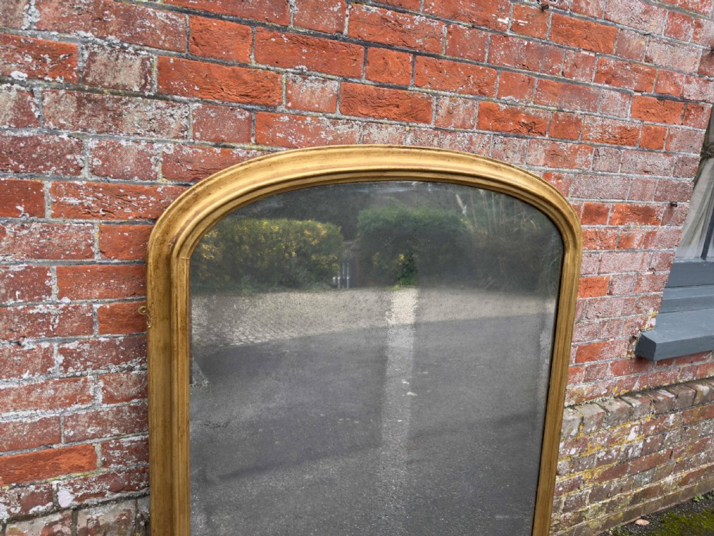 A Splendid large Antique English 19th Century carved wood & gesso arched top gilt Overmantle Mirror. View II