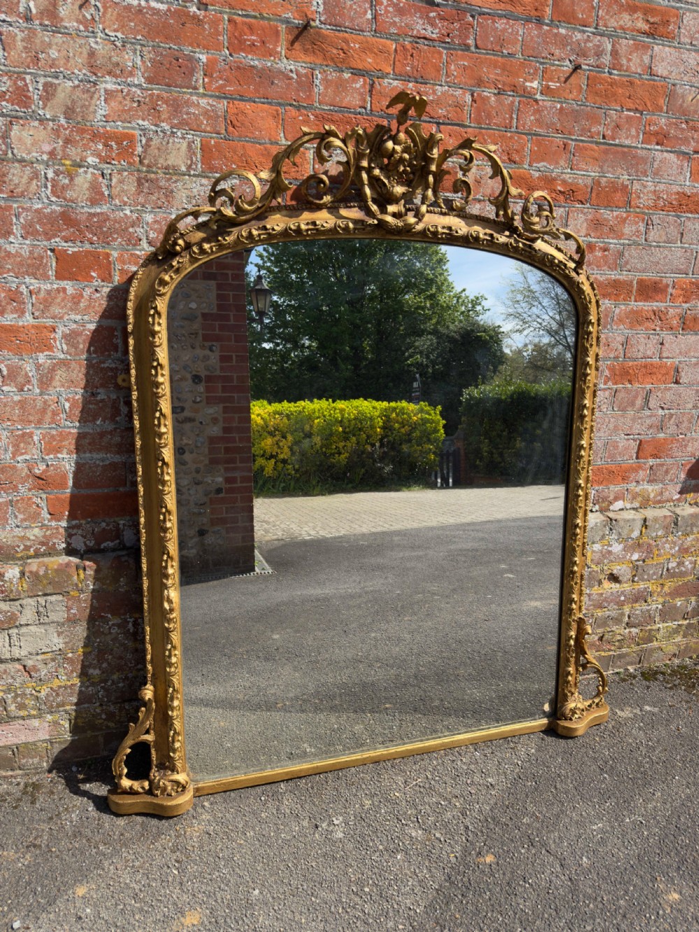 A Stunning large Antique English 19th Century carved wood & gesso arched top gilt Overmantle Mirror.