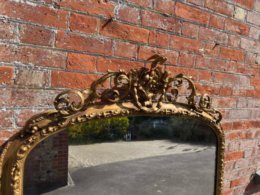 A Stunning large Antique English 19th Century carved wood & gesso arched top gilt Overmantle Mirror. View III